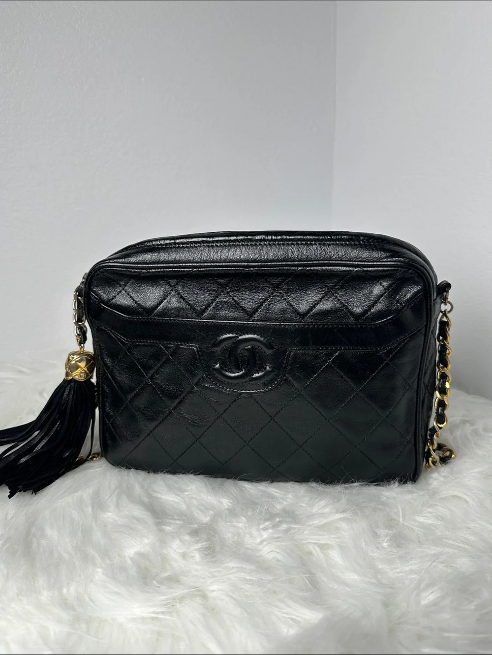 CHANEL Black Quilted Lambskin Crossbody with Tassel and Chain